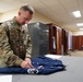 AFMAO prepares uniforms for the fallen