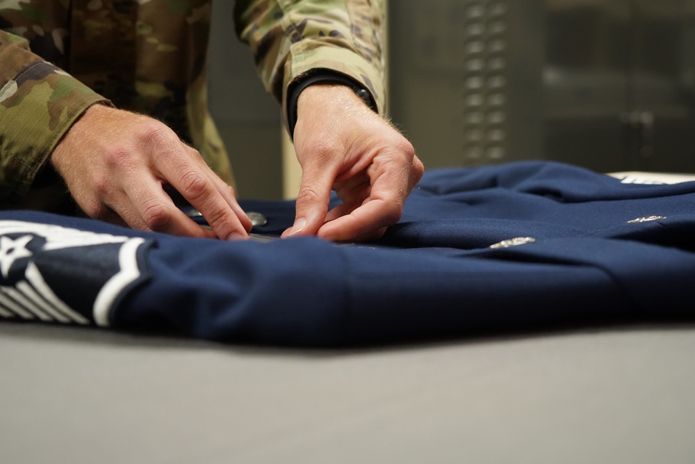 AFMAO prepares uniforms for the fallen