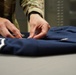 AFMAO prepares uniforms for the fallen