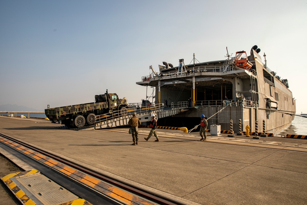 Exercise Active Shield 2021: USNS Guam (T-HST-1) makes port to receive military vehicles