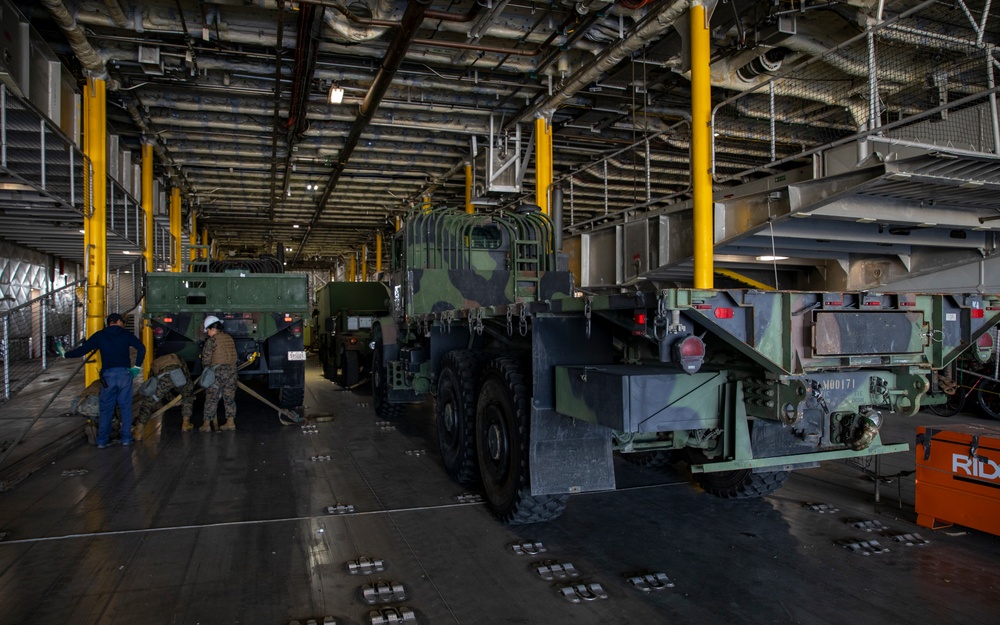 Exercise Active Shield 2021: USNS Guam (T-HST-1) makes port to receive military vehicles