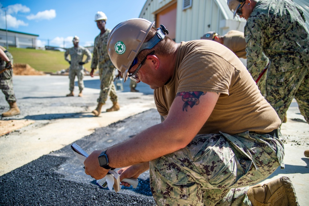 DVIDS - Images - US Navy Seabees assigned to NMCB-5 place asphalt ...