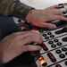 AFN Kaiserslautern radio DJ adjusts levels on board