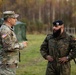 U.S. Army Maj. Speaks with German Army Officer