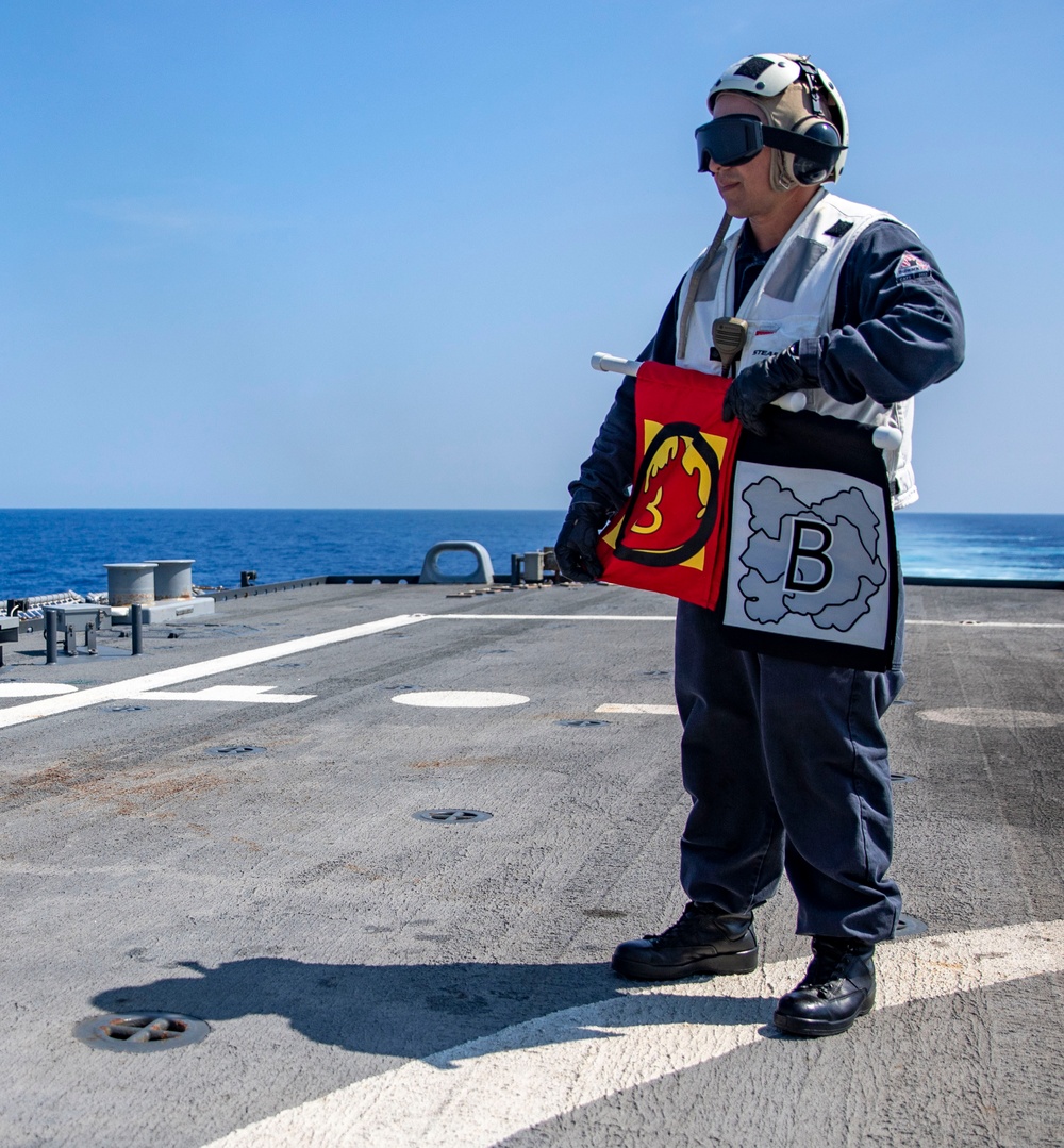 USS Billings Sailor Simulates a Fire During Crash and Salvage Drill