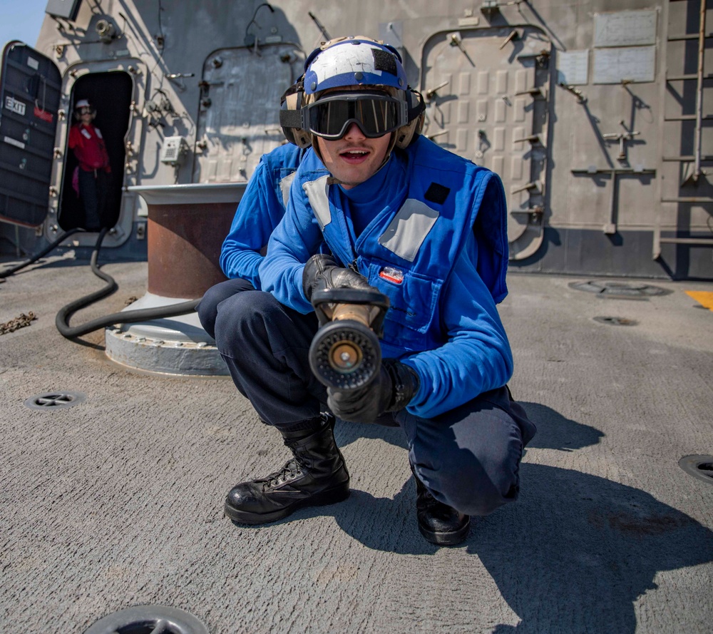 USS Billings Sailor Responds to a Simulated Fire During Crash and Salvage Drill