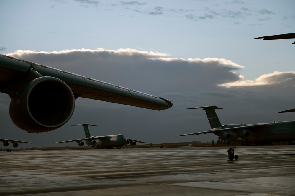 C-5M aircrew departing Travis AFB flight line