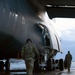 C-5M aircrew departing Travis AFB flight line