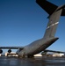 C-5M aircrew departing Travis AFB flight line