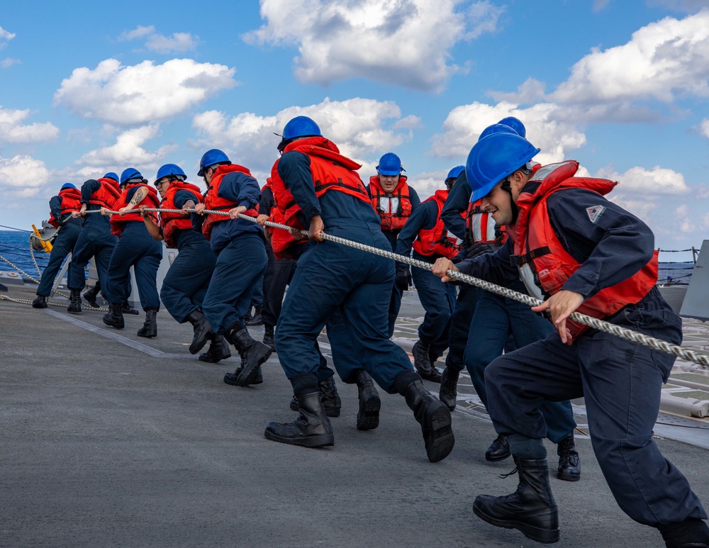 USS Dewey Sailors Heave a Line during a Replenishment-at-sea