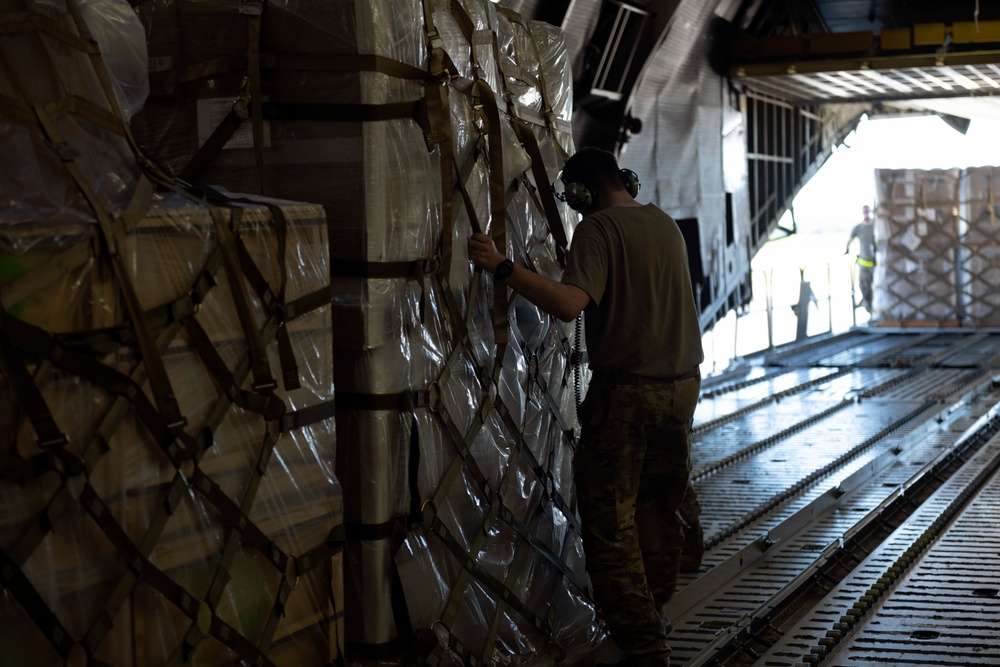 Travis AFB loads humanitarian cargo at JB Charleston