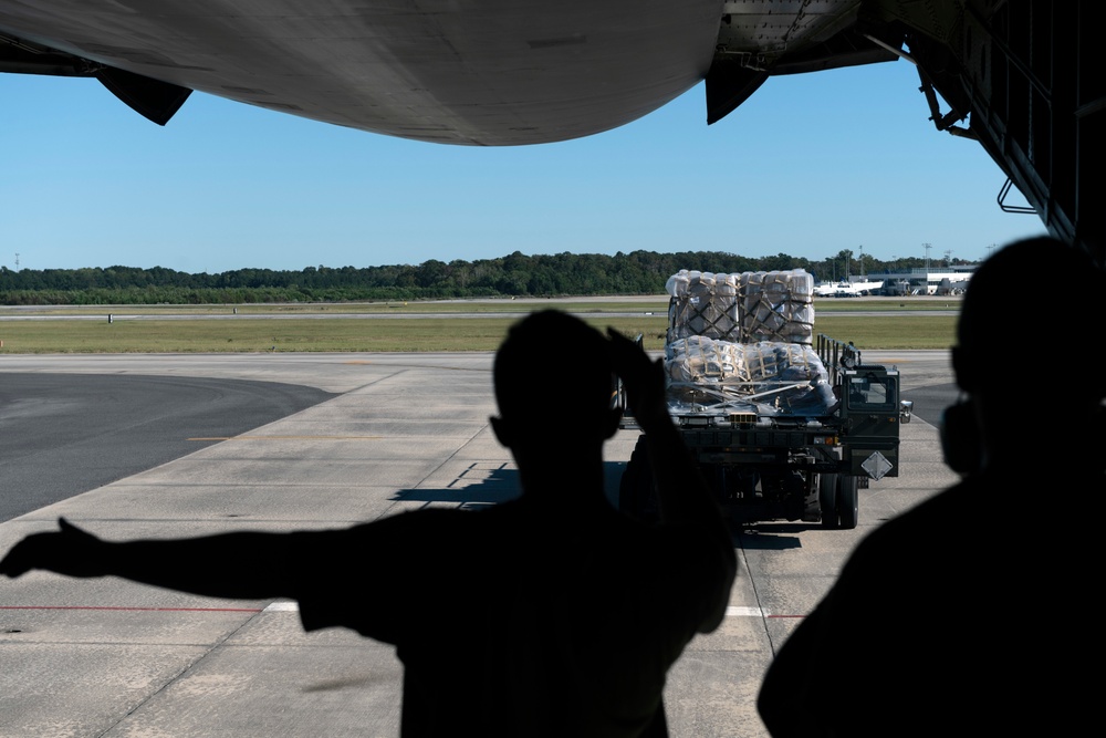 Travis AFB loads humanitarian cargo at JB Charleston