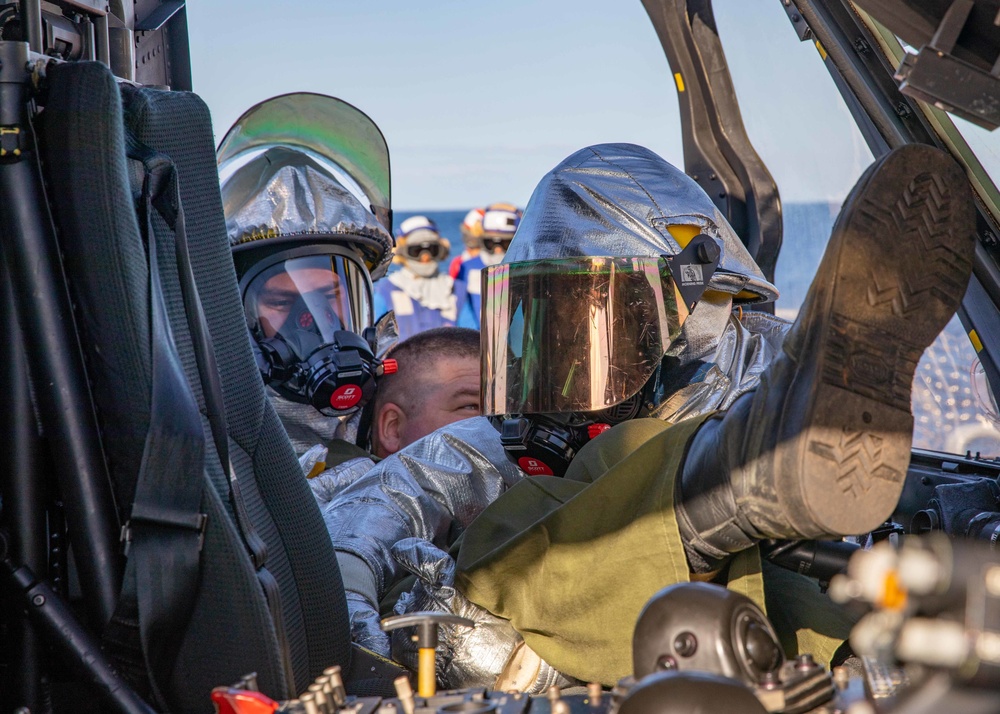 USS Dewey Sailors Conduct Rescue Operations Training on the Flight Deck