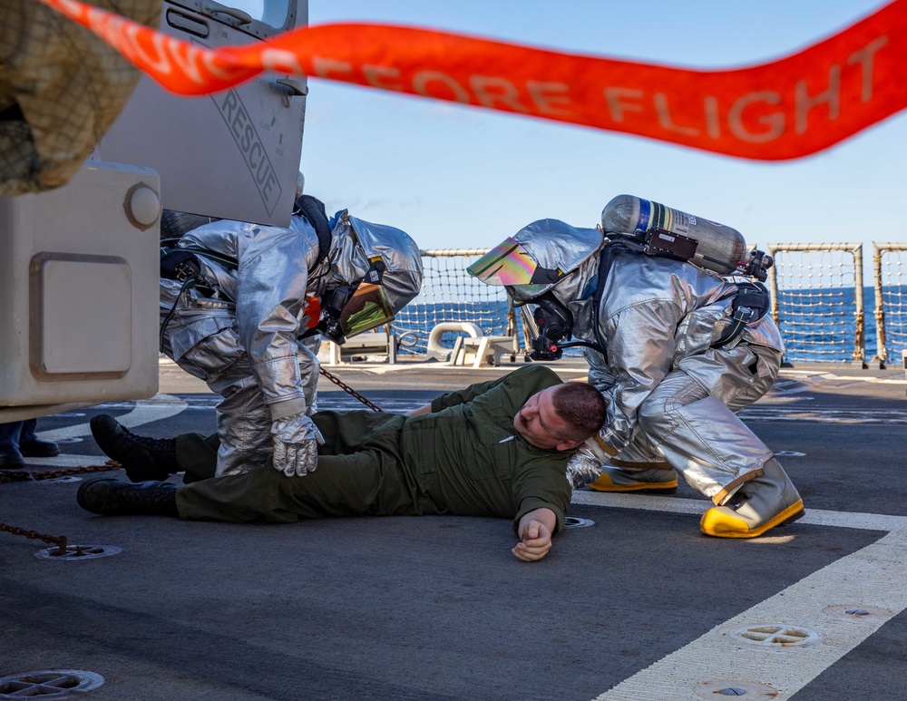 USS Dewey Sailors Conduct Rescue Operations Training on the Flight Deck