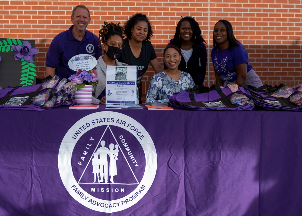 SJAFB Airmen participate in Walk in my Shoes, Domestic Violence Awareness