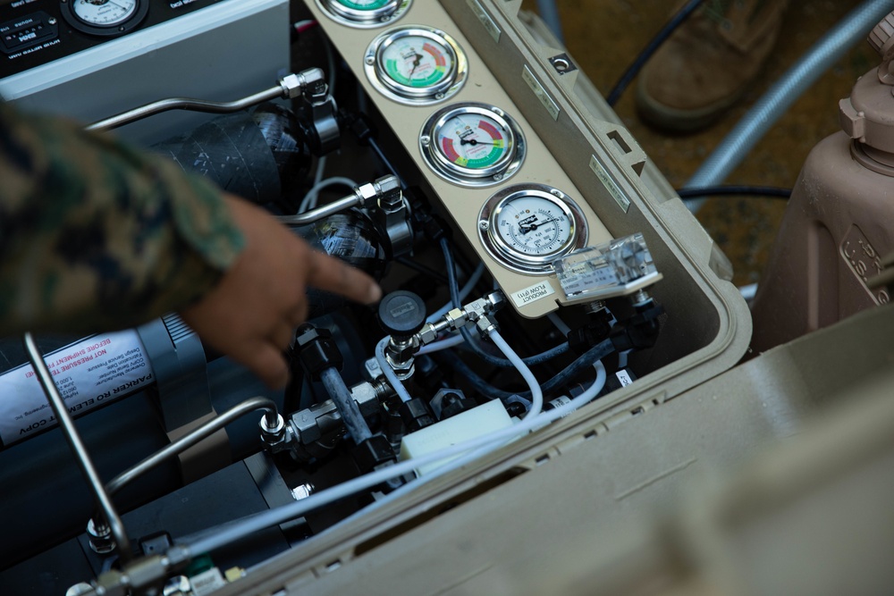 Marines with CLB-4 conduct cache drops in support of V 2/8