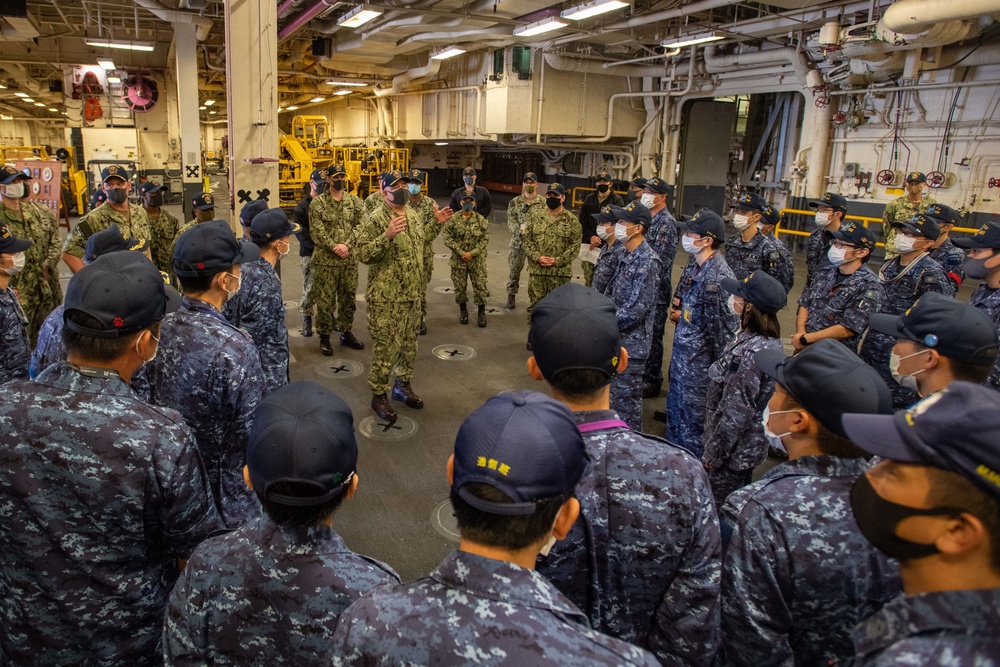 USS America conducts a tour for the crew of the JS Ise (DDH 182)