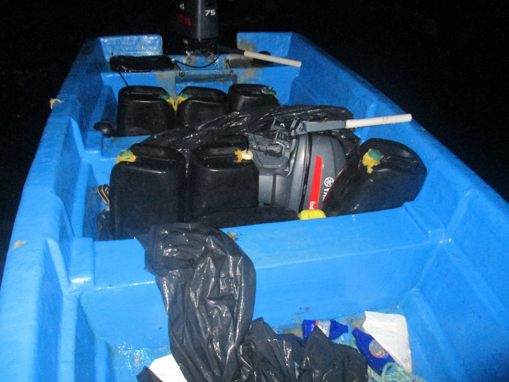 Coast Guard offloads $3.5 million in seized cocaine, transfers custody of 3 suspected smugglers in San Juan, Puerto Rico