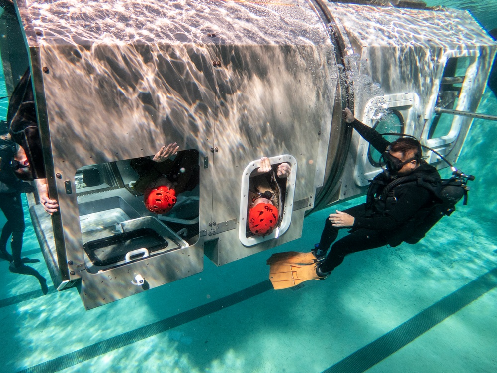 Marines participate in Underwater Egress survival Training