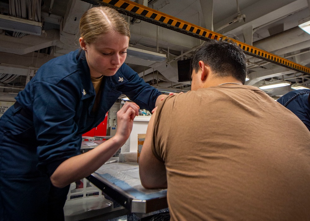 GHWB Sailors Receive Influenza Shot