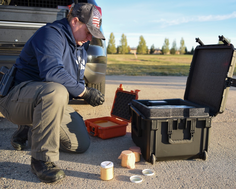 319th Security Forces Squadron partners with local law enforcement during military working dog training day