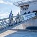 U.S. Navy Sailors and U.S. Coast Guardsman Observe Morning Colors