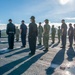 U.S. Navy Sailors and U.S. Coast Guardsman Observe Morning Colors