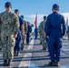 U.S. Navy Sailors and U.S. Coast Guardsman Observe Morning Colors