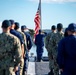 U.S. Navy Sailors and U.S. Coast Guardsman Observe Morning Colors