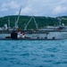 USS Hampton Moors Alongside USS Frank Cable