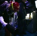 USS Sioux City Sailor Simulates Using a CO2 Bottle to Combat a Fire During an ITT Dril