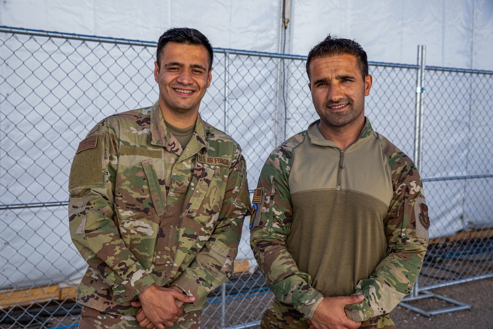 Task Force Holloman translators interact with Afghan evacuee children