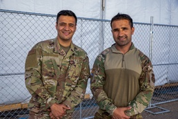 Task Force Holloman translators interact with Afghan evacuee children