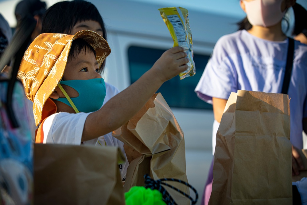 US Marines and local community residents participate in a Tsunami Evacuation Drill