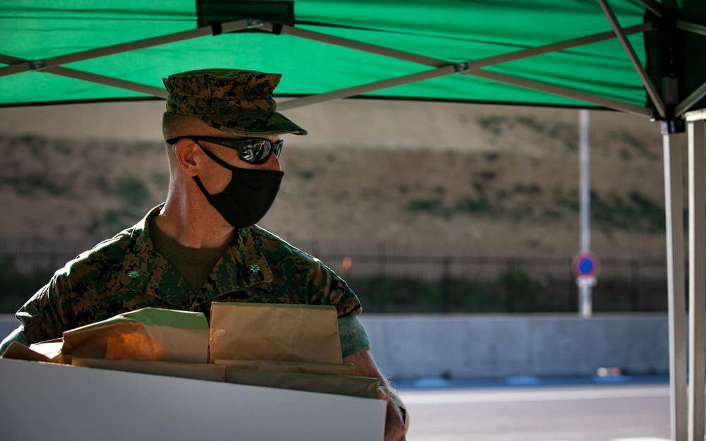 US Marines and local community residents participate in a Tsunami Evacuation Drill