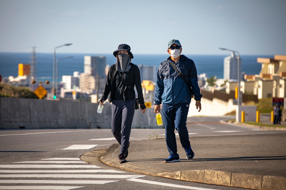 US Marines and local community residents participate in a Tsunami Evacuation Drill