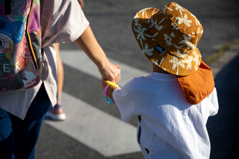 US Marines and local community residents participate in a Tsunami Evacuation Drill