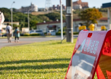 US Marines and local community residents participate in a Tsunami Evacuation Drill