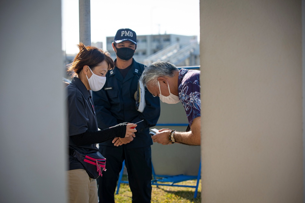 US Marines and local community residents participate in a Tsunami Evacuation Drill