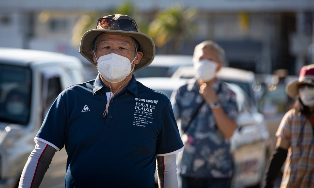 US Marines and local community residents participate in a Tsunami Evacuation Drill