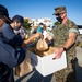 US Marines and local community residents participate in a Tsunami Evacuation Drill