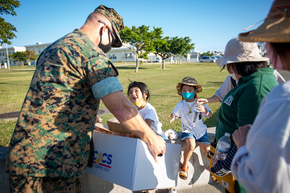 US Marines and local community residents participate in a Tsunami Evacuation Drill