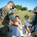 US Marines and local community residents participate in a Tsunami Evacuation Drill