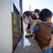 US Marines and local community residents participate in a Tsunami Evacuation Drill