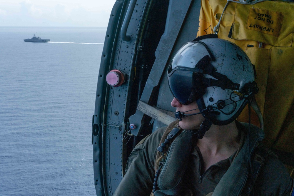 Helicopter Sea Combat 23 (HSC 23) Sailor transits the South China Sea