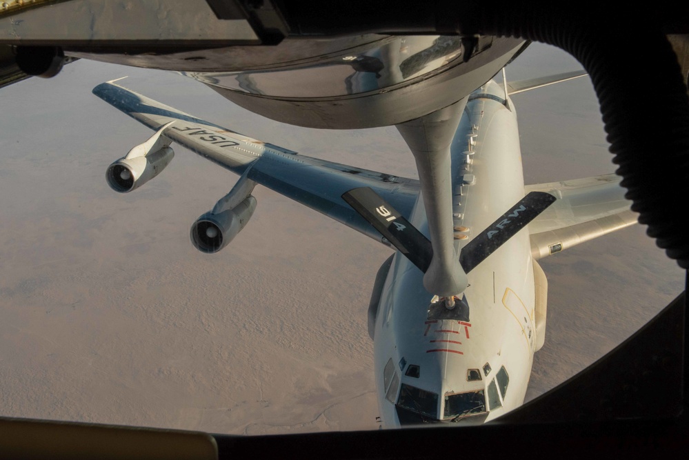 The 93rd Expeditionary Air Refueling Squadron performs an over-the-shoulder flight with the 384th EARS