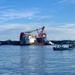 D/B THOR heavy lift vessel transits past Golden Ray wreck site