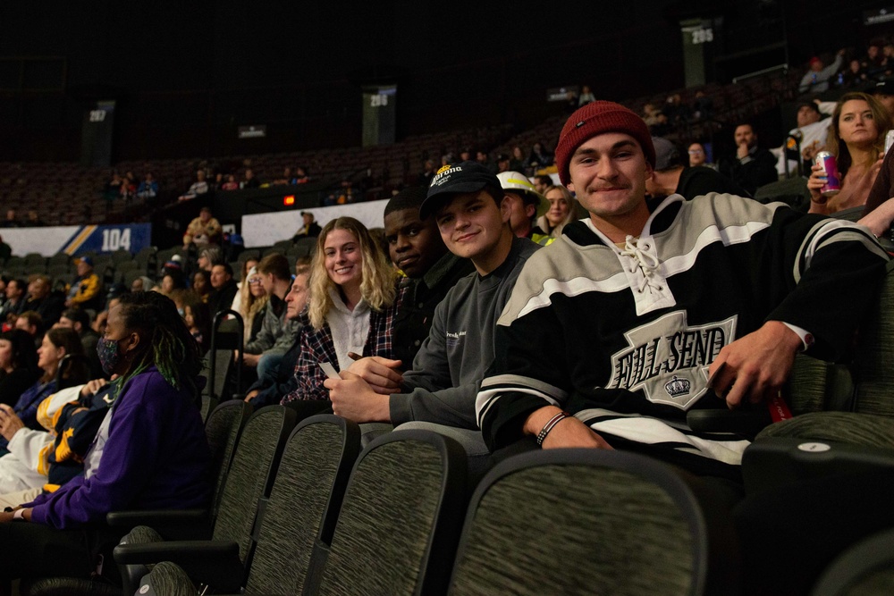 Sailors pose at hockey game