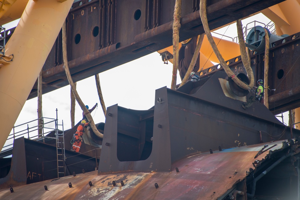 Rope-access Technicians fit grommets