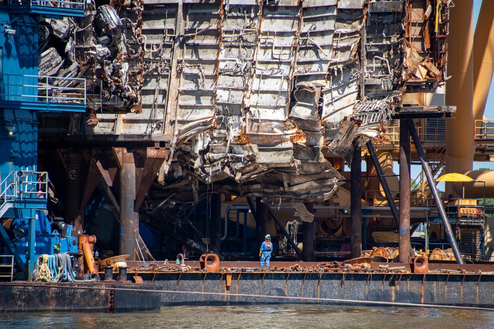 The Salvage Master surveys the underside of Section Five